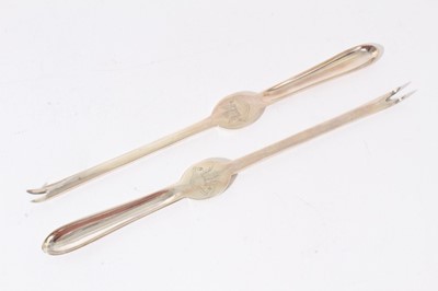 Lot 204 - Pair of lobster picks, crested, by Goldsmiths and Silversmiths, Sheffield 1928, cased