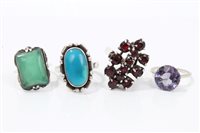 Lot 760 - Four dress rings - to include faux alexandrite...