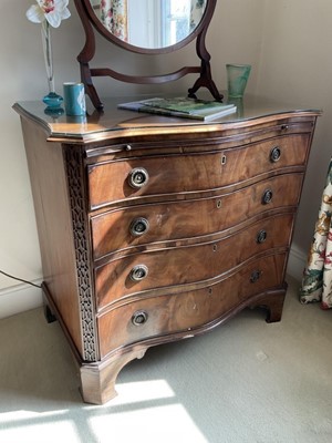 Lot 1352 - Edwardian mahogany serpentine dressing chest