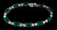 Lot 769 - Fine emerald and diamond bracelet - comprising...