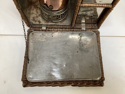 Lot 2103 - Edwardian G.W. Scott & Son wicker two person 'En Route' tea basket 'The Continental', comprising copper and brass kettle and burner, together with enamel plates, cutlery, sandwich box and other ite...