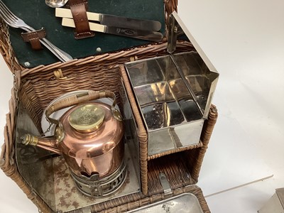 Lot 2103 - Edwardian G.W. Scott & Son wicker two person 'En Route' tea basket 'The Continental', comprising copper and brass kettle and burner, together with enamel plates, cutlery, sandwich box and other ite...