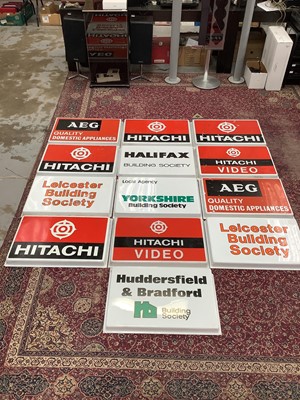 Lot 2703 - Collection of AEG ,Hitachi and other plastic shop signs (13)