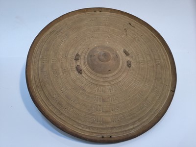 Lot 851 - Somalian dried leather gashan shield, with decoration in ink on reverse side, 34cm