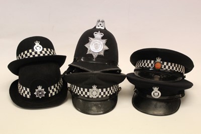 Lot 868 - Lot Police helmets and caps