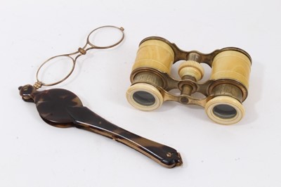 Lot 870 - Late 19th century pair of adjustable ivory opera glasses, 11cm wide, together with a pair of Victorian tortoiseshell lorgnettes