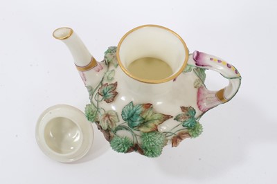 Lot 133 - 19th century continental floral encrusted tea/coffee pot, of a fine porcelain body