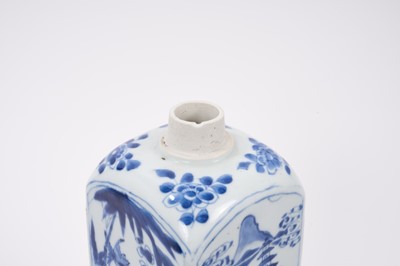 Lot 67 - Rare Chinese blue and white square gin/spirit bottle and cover, Kangxi (1662-1722), two sides decorated with a figure in a landscape scene, the other two with bamboo, prunus and a bird, floral spra...