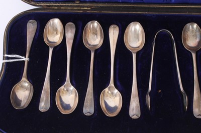 Lot 307 - Cased set of twelve silver Hanoverian Rattail pattern coffee spoons, with matching sugar tongs