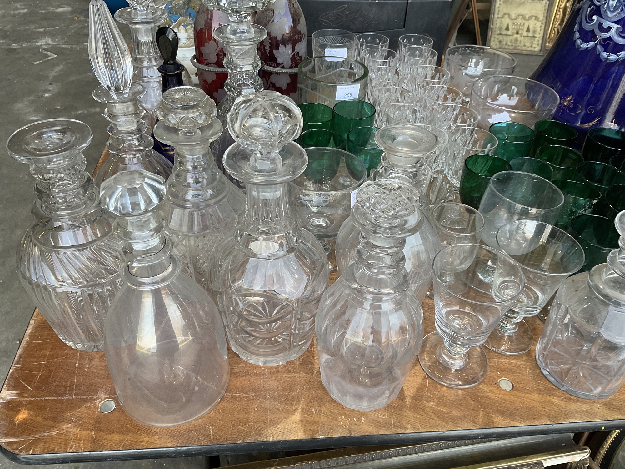 Lot 258 Decorative glassware including three bottle