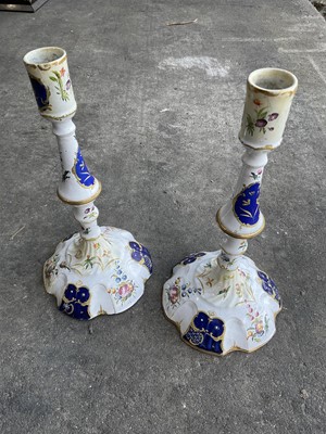 Lot 259 - Pair of 18th century Staffordshire enamel candlesticks