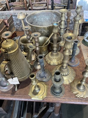Lot 267 - Collection of brass candlesticks, pestles and mortars and other brassware