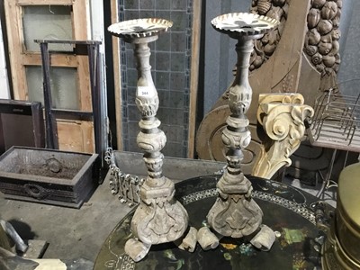 Lot 344 - Pair Antique painted pine pricket alter candlesticks on scroll feet with associated metal drip pans 63 cm