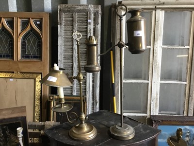 Lot 352 - Two antique brass students lamps