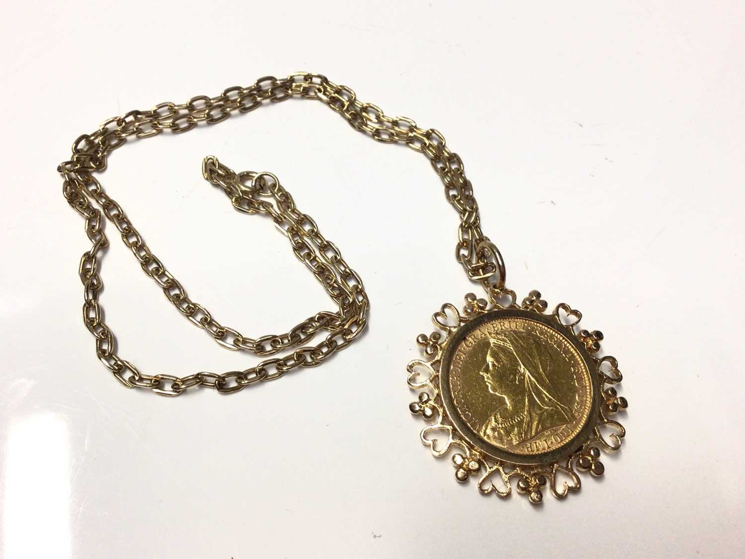 Lot 14 - Victorian gold sovereign in 9ct gold pendant mount on chain
