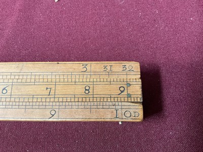 Lot 828 - Rare 18th century boxwood rule with three slides, each with measurements, the removeable rules with Ale, Wine, Malt etc, measurements for use by Customs & Excise in the brewery trade. Stamped 'E. R...