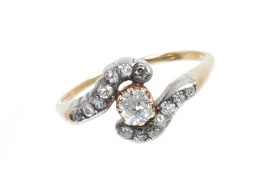 Lot 418 - Edwardian diamond crossover ring