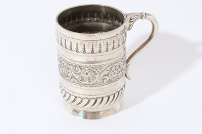 Lot 368 - Victorian silver christening mug London 1897, silver powder box, silver photograph frame mount, silver bon bon dish and a silver mounted glass trinket pot