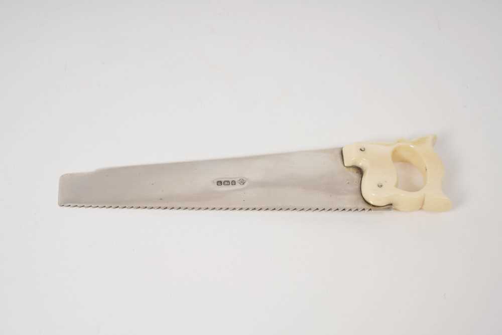 Lot 251 - Victorian silver cucumber saw, with carved ivory handle (Sheffield 1899)