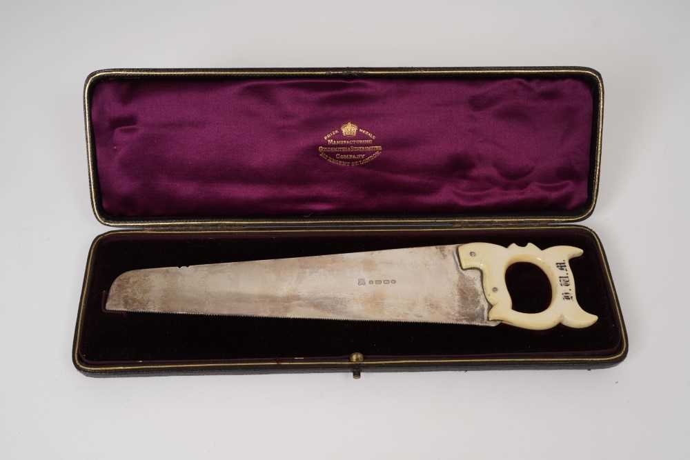 Lot 253 - Exceptionally large Victorian silver cucumber saw, with carved ivory handle baring initials H.W.M.
