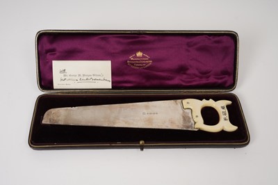 Lot 253 - Exceptionally large Victorian silver cucumber saw, with carved ivory handle baring initials H.W.M.