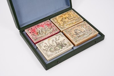 Lot 814 - Cased set of four early 18th century French ivory gaming boxes of rectangular form, each with penwork decoration depicting amorous scenes and sayings and containing a quantity of gambling chips and...