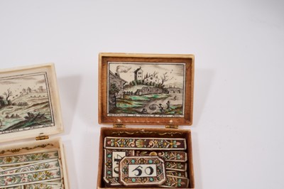 Lot 814 - Cased set of four early 18th century French ivory gaming boxes of rectangular form, each with penwork decoration depicting amorous scenes and sayings and containing a quantity of gambling chips and...