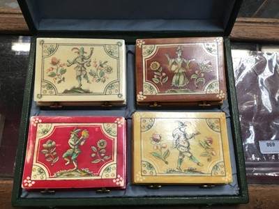 Lot 814 - Cased set of four early 18th century French ivory gaming boxes of rectangular form, each with penwork decoration depicting amorous scenes and sayings and containing a quantity of gambling chips and...