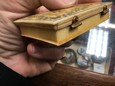 Lot 814 - Cased set of four early 18th century French ivory gaming boxes of rectangular form, each with penwork decoration depicting amorous scenes and sayings and containing a quantity of gambling chips and...