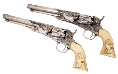 Lot 822 - A very fine cased pair of silver plated Gustave Young deluxe engraved .36 Cal. Colt Model 1862 Police revolvers, 61/2 inch sighted barrels stamped SAMl. COLT HARTFORD CT. and two line COLT PATENT s...