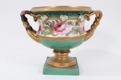 Lot 50 - Large English porcelain urn-type vase, early to mid 19th century, twin-handled on a square base, polychrome painted with roses on a green ground with gilt highlights, 24cm high