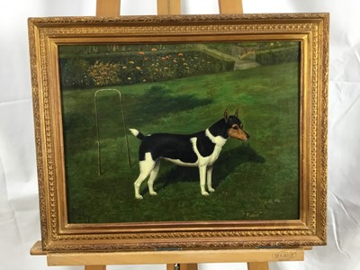 Lot 1044 - William Albert Clark (1880 - 1963) oil on canvas, A black and white Jack Russell named Flusie standing by a croquet hoop in a garden, signed inscribed and dated 1944. 34 x 45cm.