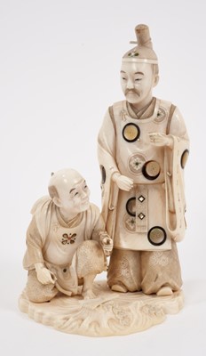 Lot 740 - Late 19th century Japanese carved ivory and shibayama inlaid figure group of a priest and kneeling servant, signed 19 cm high