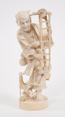 Lot 741 - Late 19th century Japanese carved ivory figure of a street entertainer holding a ladder being climbed by bird like creatures, signed 17 cm high