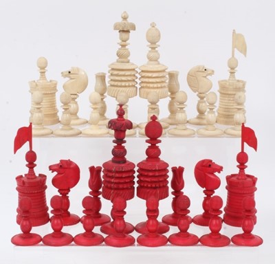 Lot 720 - 19th century carved and red stained bone chess set, the queen 12cm high