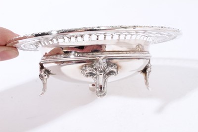 Lot 235 - Pair of 1930s silver bon-bon dishes, with pierced flared borders, on four decorative feet