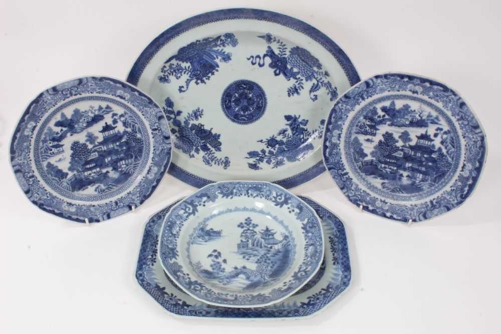 Lot 85 - Five 18th century Chinese blue and white export dishes, one decorated in the Fitzhugh style and the rest with landscapes (5)
