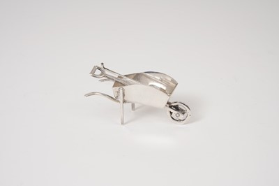 Lot 237 - Contemporary silver novelty wheel barrow with fork, spade and half moon cutter (London 1989/90)