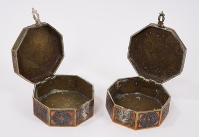Lot 136 - Two similar Mamluk revival inlaid metalware boxes, each of octagonal form with locking clasp and Islamic script ornament, 9.5cm wide