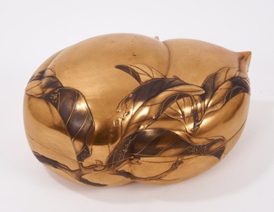 Lot 747 - 19th century Japanese lacquer box and cover, in the form of a fruit with raised leaf ornament, 16cm