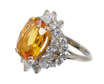 Lot 405 - Fine yellow sapphire and diamond cluster ring