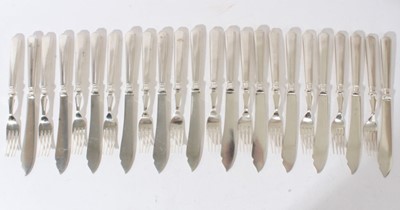 Lot 245 - 1930s set 12 pairs of silver Athenian pattern fish eaters, with silver blades and handles