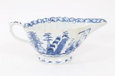 Lot 147 - A Bow large sauce boat, painted in blue with the Desirable Residence pattern, circa 1760