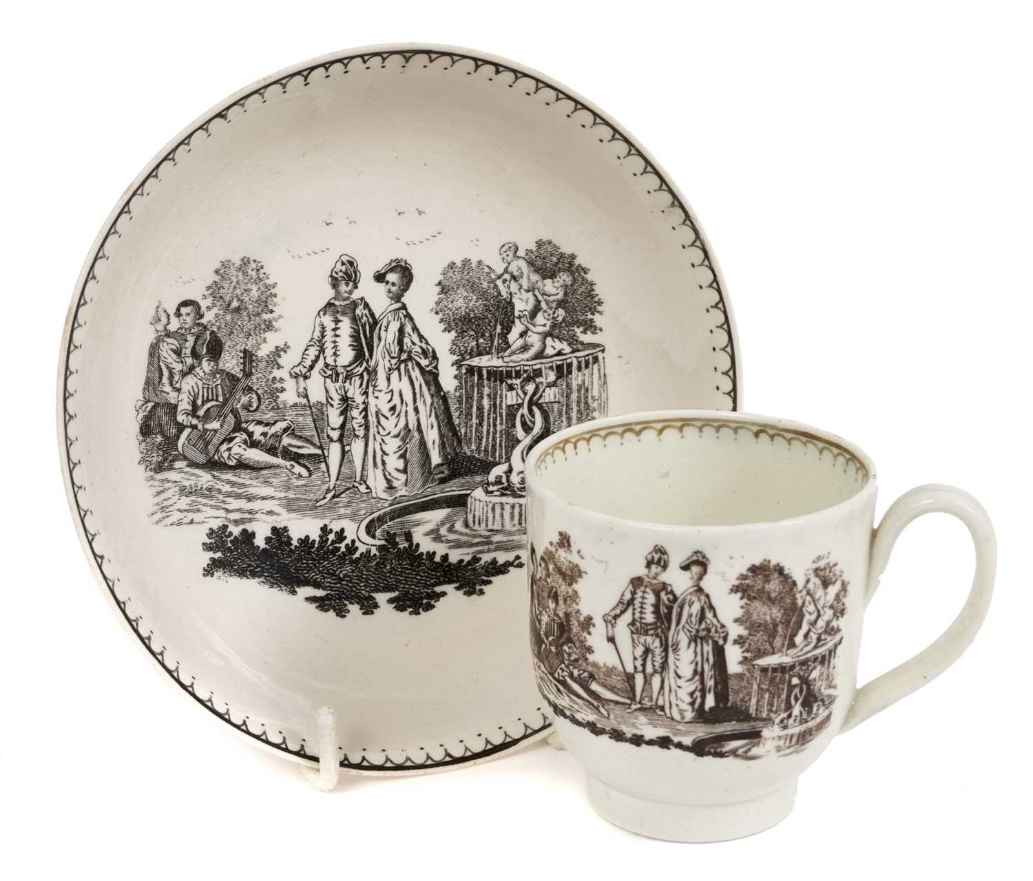 Lot 101 - A rare Pennington Liverpool coffee cup and saucer, printed in black with La Cascade and Seranade, after Watteau, circa 1780. Provenance; Bernard Watney Collection. With Roderick Jellicoe