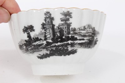 Lot 192 - A Worcester fluted tea bowl and saucer, printed with ruins, circa 1770