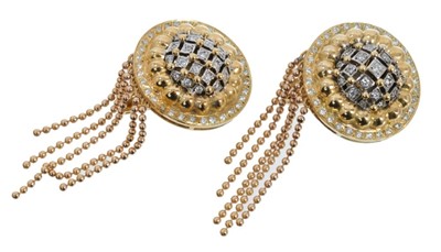 Lot 527 - Pair of diamond and 18ct yellow gold earrings, the circular target shape diamond-set discs with gold tassel drops, stamped 750. Approximately 60mm.