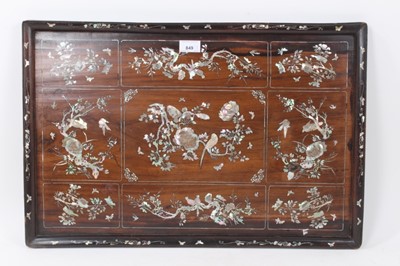 Lot 849 - Late 19th / early 20th century Chinese hardwood and mother of pearl inlaid tray, of rounded rectangular dished form, inlaid with birds and insects and foliage, 41 x 62cm, together with two others s...