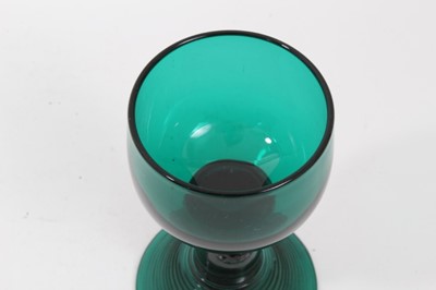 Lot 114 - A George III green tinted wine glass, in German style