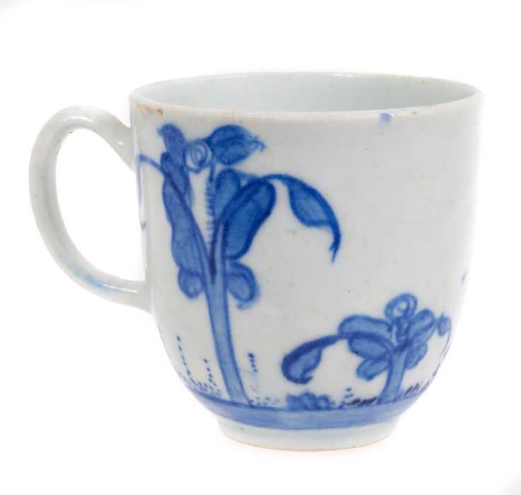 Lot 121 - An early Bow blue and white coffee cup, circa 1750