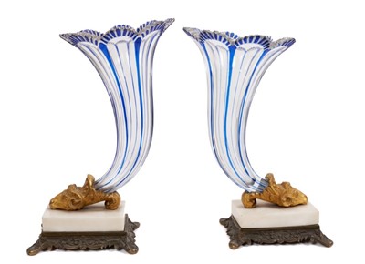 Lot 126 - A pair of mid 19th century Bohemian blue flash glass cornucopia, on parcel gilt bronze and marble bases